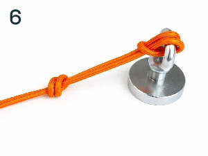 Hogyan kössünk csomót a mágnesre